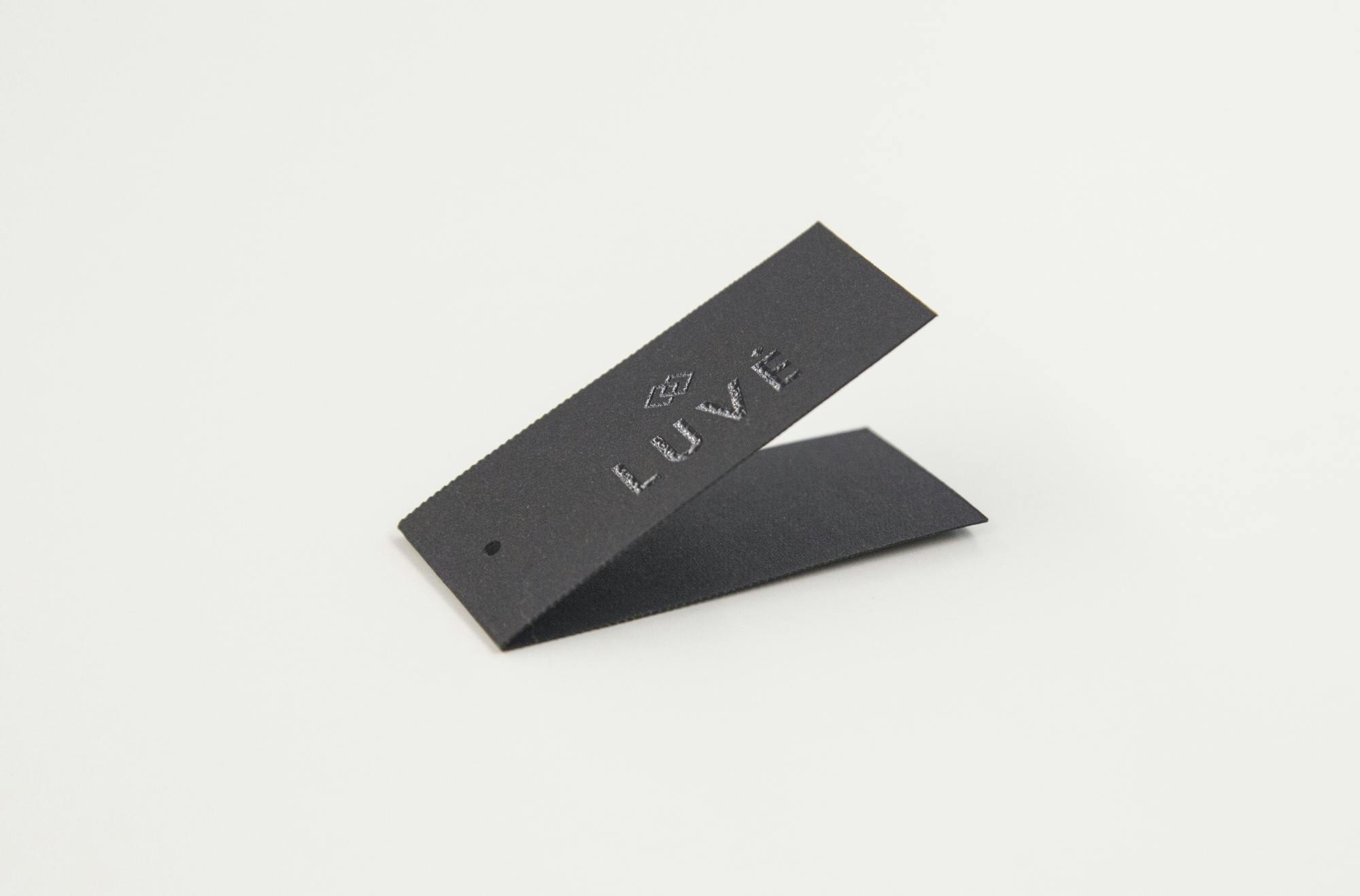 Paper hang tag "Luvé" © swissQprint 